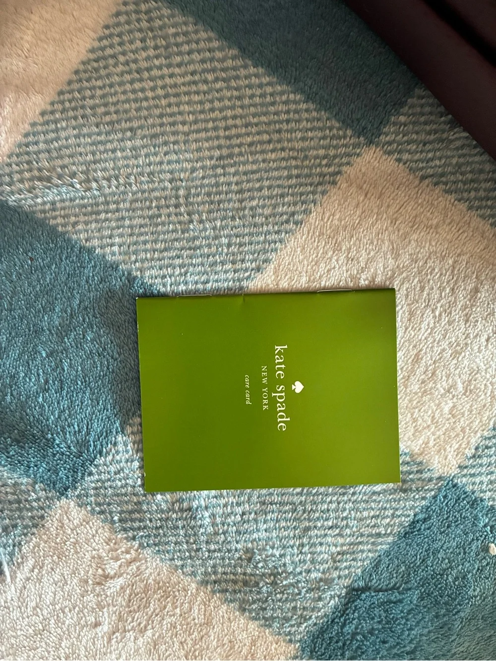 kate spade plum/burgundy zip-around card wallet with gold logo